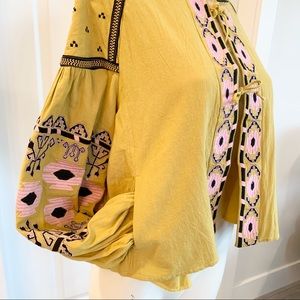 Mustard yellow linen jacket with pink embroidery